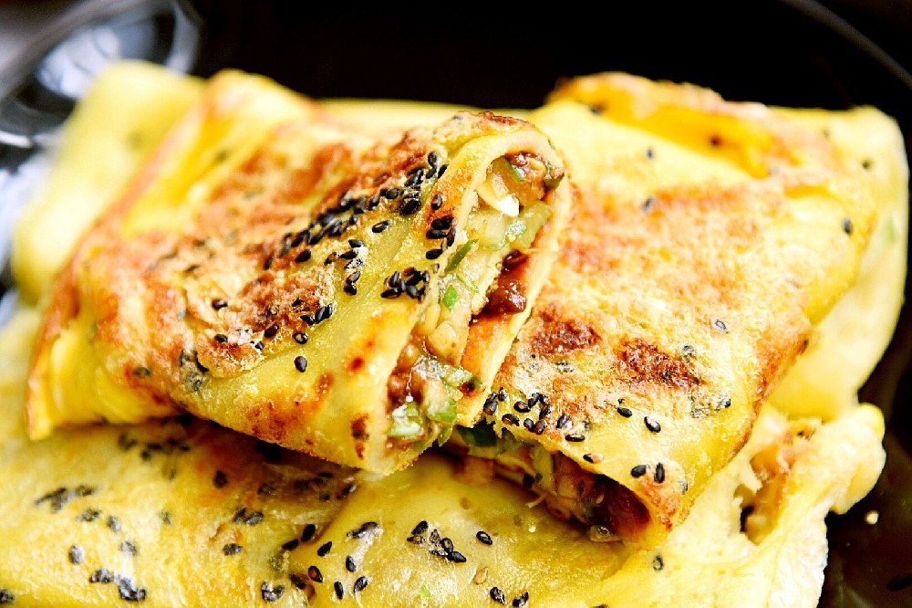 想學正宗煎餅果子？從零開始學煎餅果子，選對培訓機構(gòu)是關(guān)鍵！