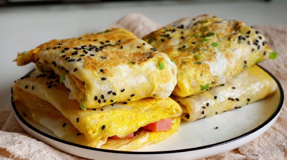 在哪里學做早餐，煎餅果子？來這里學正宗做法！