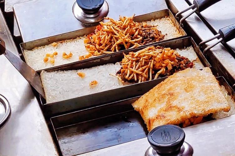 擺攤鍋巴飯?jiān)趺醋?？配方做法全解，學(xué)會(huì)輕松開攤賺錢！